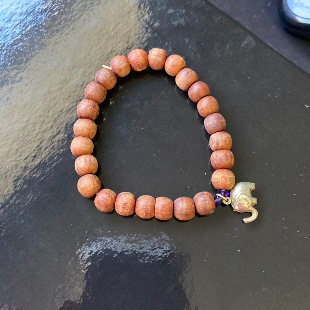 Brown bead bracket with elephant charm